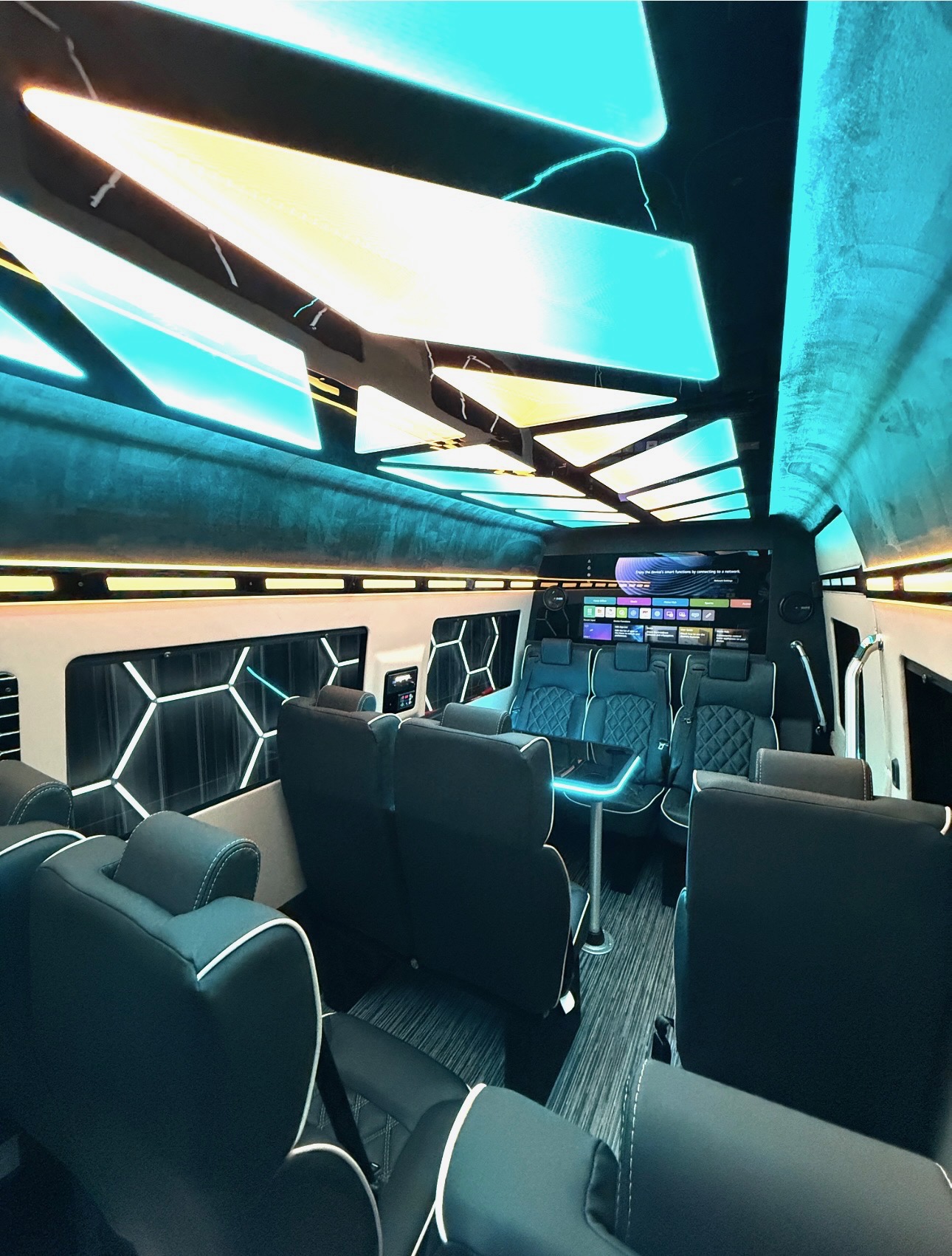 Luxury Sprinter interior with illuminated geometric ceiling panels