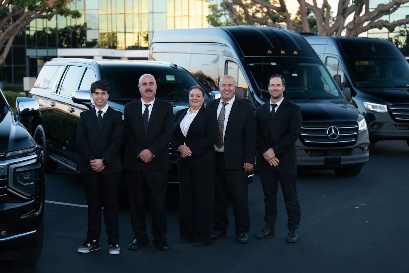 The Best Ride Transportation team of chauffeurs in front of the fleet